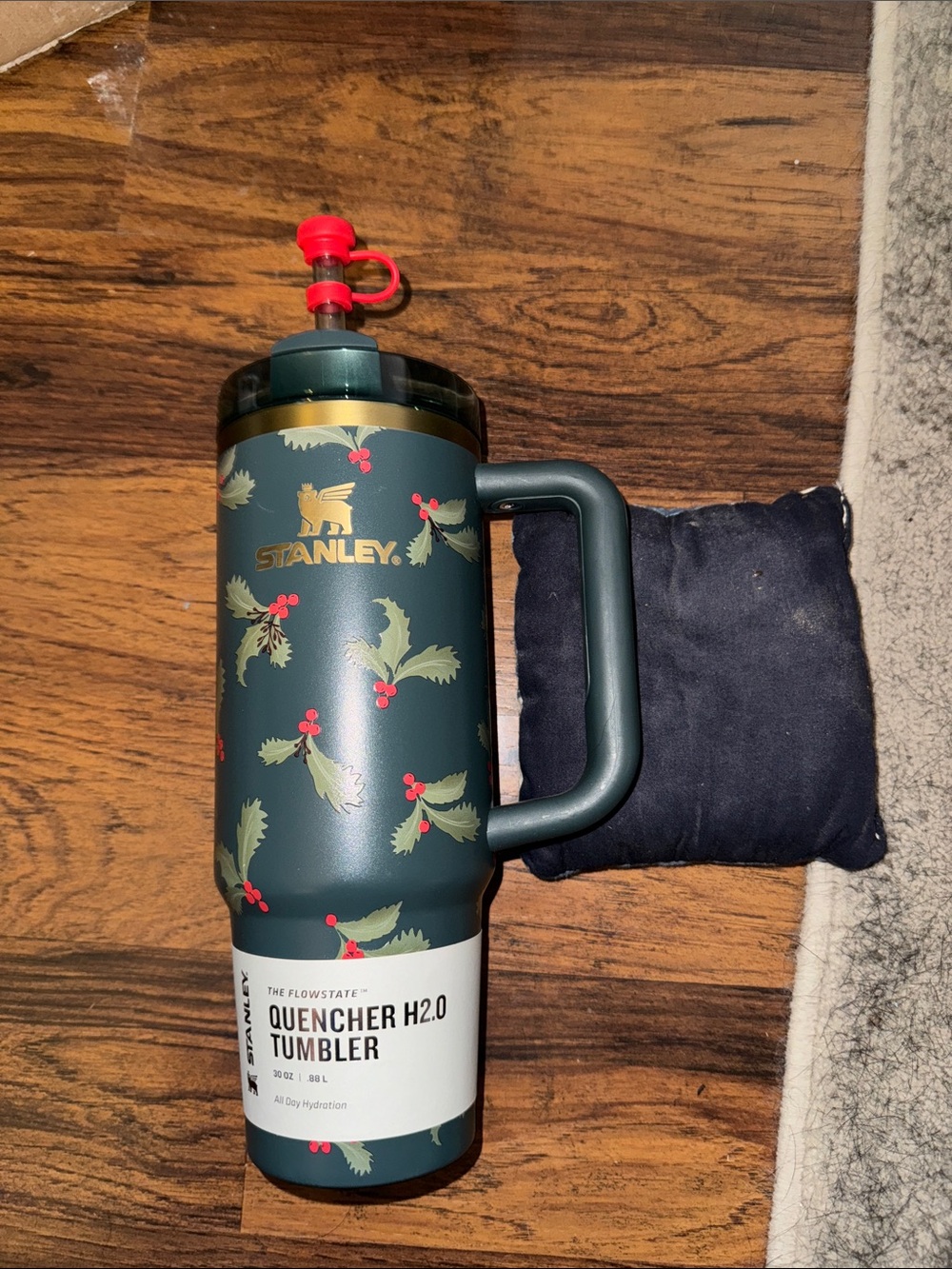 Stanley Green Holiday Quencher Tumbler with Gold Logo and Red Berry Accents